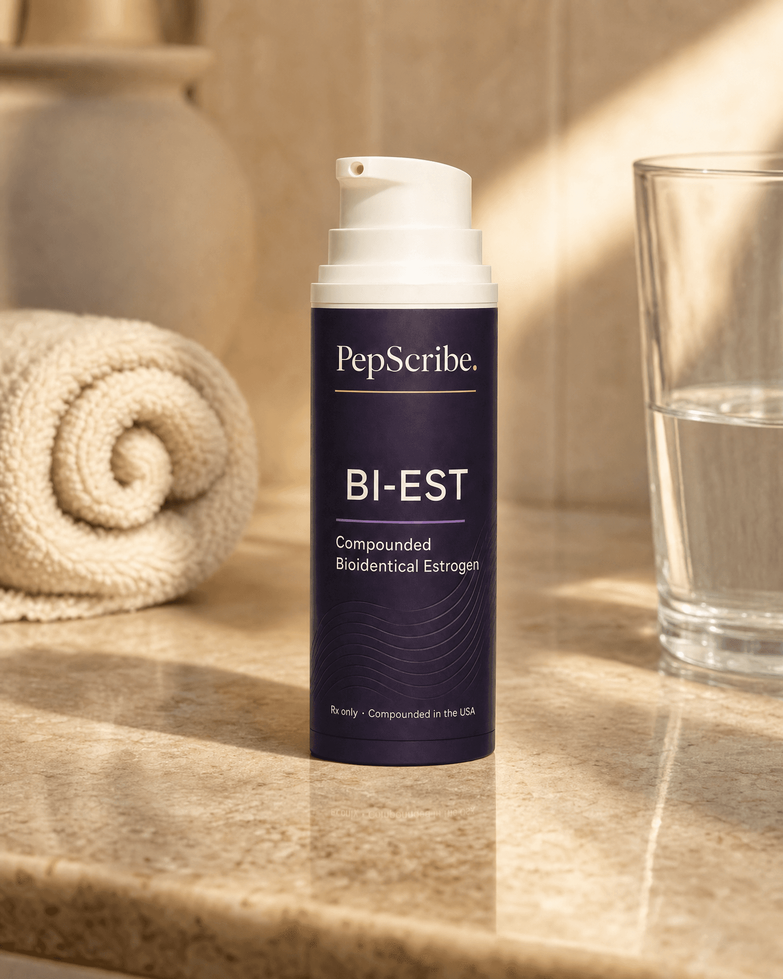 A PepScribe-branded compounded BI-EST bioidentical estrogen cream bottle on a sunlit bathroom counter beside a rolled towel and a glass of water.