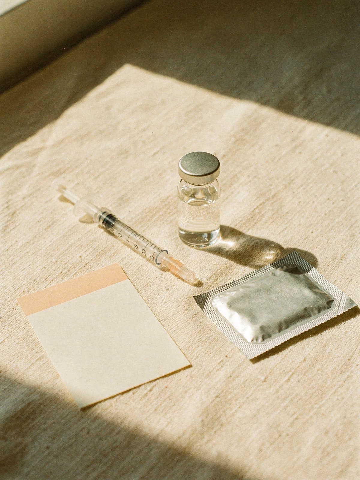 Sermorelin clinical preparation on a brushed-steel pharmacy surface