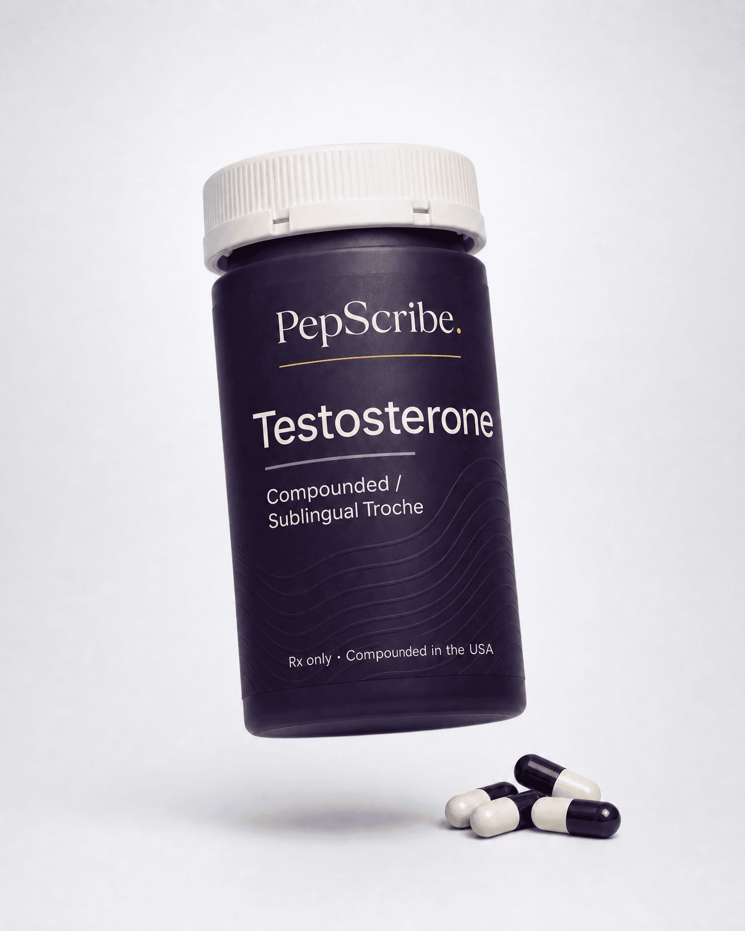 A PepScribe-branded compounded testosterone sublingual troche bottle, angled against a soft studio backdrop.