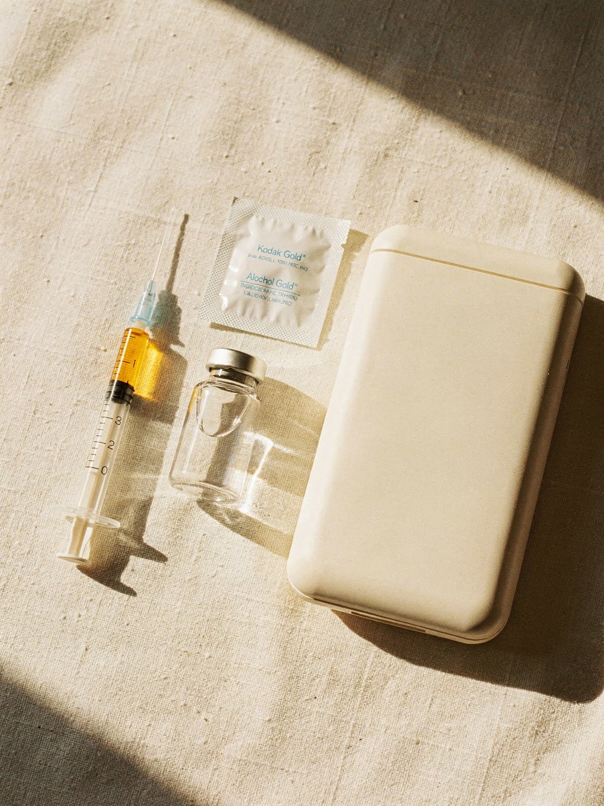 Tirzepatide clinical preparation on a brushed-steel pharmacy surface